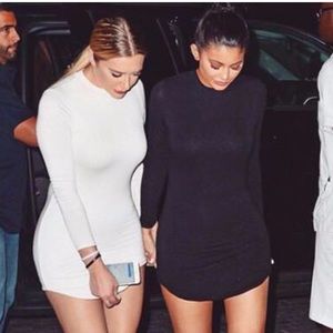 FashionNova Beverly Hills tunic in black.